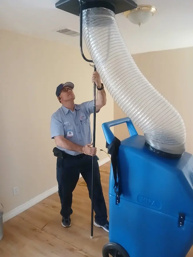 Mini Split Installation technician using HEPA equipment in Evergreen